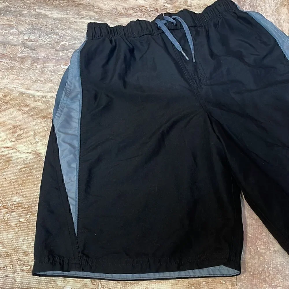 Nike men’s black/gray swim trunks. Size S.